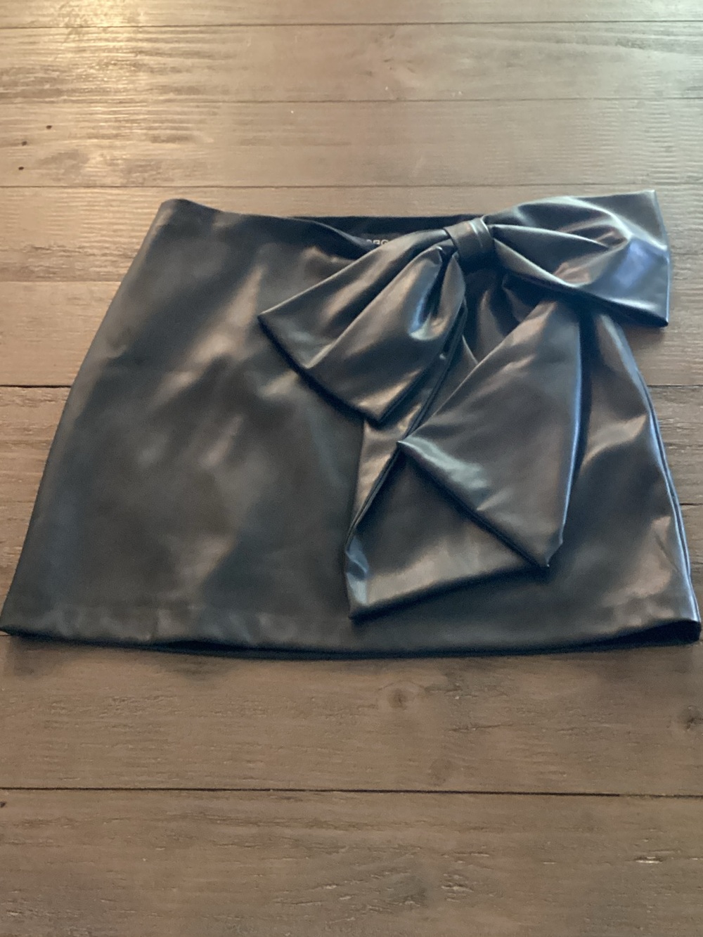 BCBG Black Faux Leather Mini Skirt with Oversized Bow